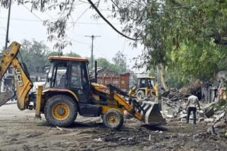 Bulldozers raze slum structures in Loni on June 18 1751245224809 1751245239051